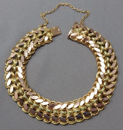 Bracelet Bracelet en 2 ors 18k, ruban souple articulé maille fantaisie. Fermoir à...