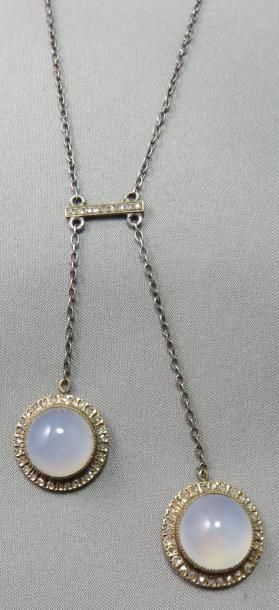 null COLLIER "Négligé" en or 18k et argent à 800/00, composé de 2 pendants le centre...