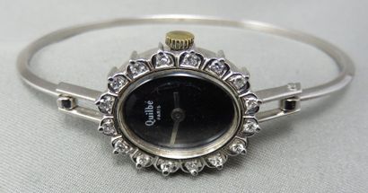 null QUILBE PARIS. Montre Bracelet de Dame en or gris à 750°/00, de forme ovale,...