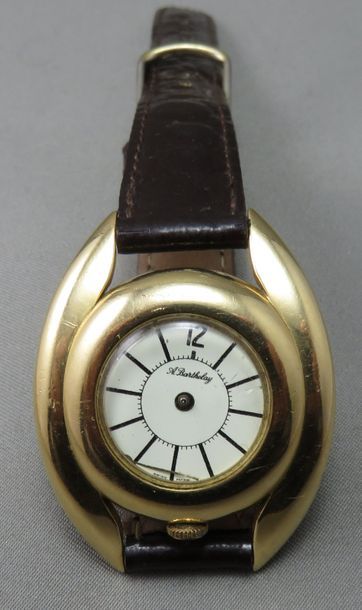 null A. BARTHELAY. Montre de Dame en or à 750°/00, le boîtier rond dans un encadrement...