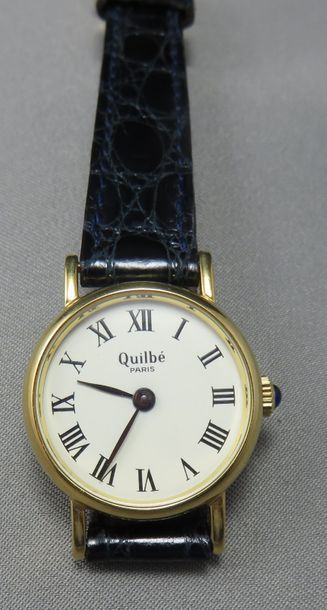 null QUILBE PARIS. Montre Bracelet de Dame en or à 750°/00 de forme ronde, cadran...