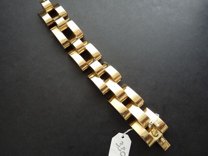 null Bracelet "Tank" en or jaune 18K (750/oo) à maillons géométriques articulés,...