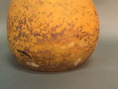 null DELATTE, Berluze pâte de verre vase with flaky decoration on an orange background,...