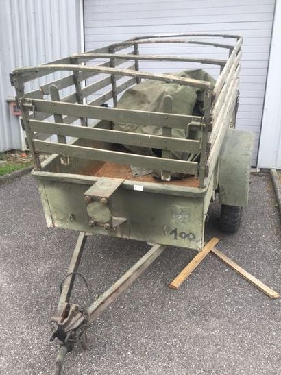 null REO trailer with roll bar, spare wheel and tarpaulin