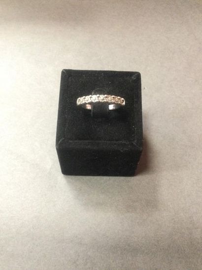 Half wedding band in 18K (750/oo) white gold,...