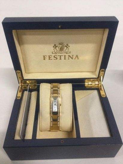 null FESTINA, Montre de femme en or jaune 18 K (750/oo) ornée de deux lignes de diamants...