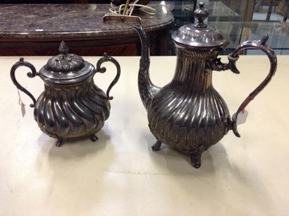 A sugar bowl and a teapot in silvery metal,...