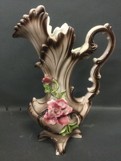 null Large pourer in slip with rose decoration, Italian work' H. 45 cm.(small ac...