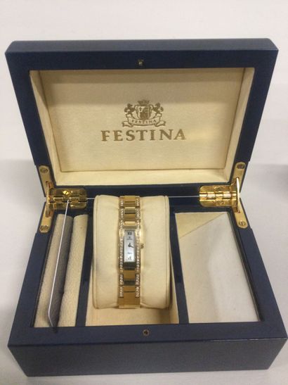 null FESTINA, Montre de femme en or jaune 18 K (750/oo) ornée de deux lignes de diamants...