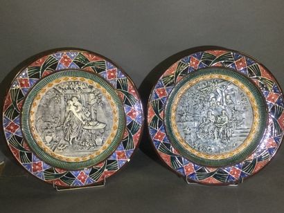 Pair of large polychrome earthenware PLATES:...