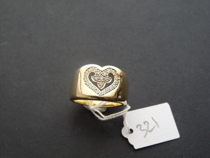 null 18K (750/oo) yellow gold ring, centered on an openwork "Heart" motif and set...