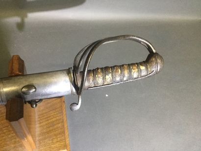  Officer's saber probably German. Handle covered with stingray decorated with a filigree....