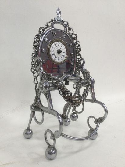  Cavalry clock in chromed metal mounted on a bit with its chains and a horseshoe...