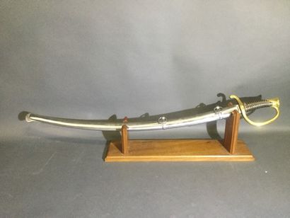 null Mounted gunner sword model 1829. Leather-covered handle with brass filigree....