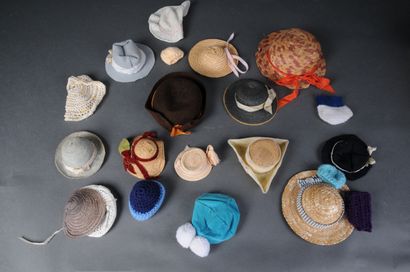 null Fifteen hats of different sizes and materials.