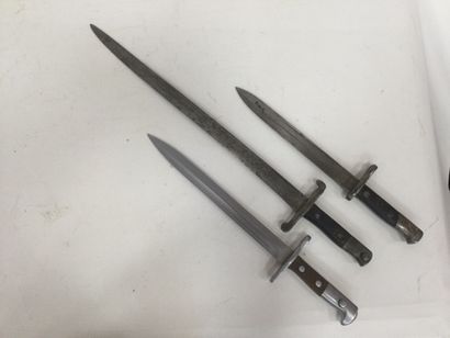 Three bayonets without scabbards