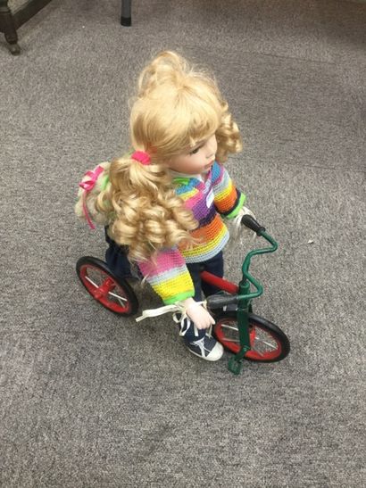 null Tricycle with porcelain doll (soft body) and its little bear