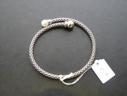 null Bracelet semi-rigide ouvert en or gris 18K (750/oo) à motif tressé de boules,...