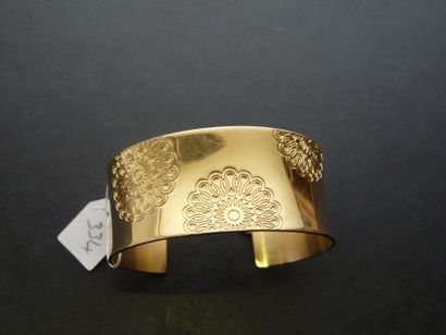 null Bracelet Manchette ouvert en métal doré incurvé lisse agrémenté de motifs de...