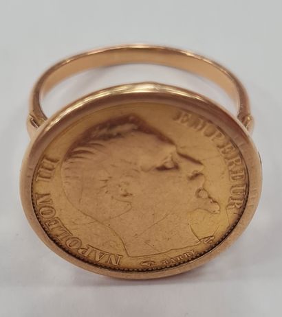 null Monnaie de 20 or Napoléon III montée en bague, monture en or jaune 18k (750/°°),...