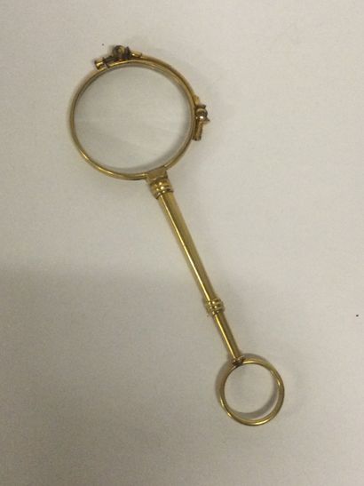 null Paire de bésicles en métal doré, L. 13 cm.