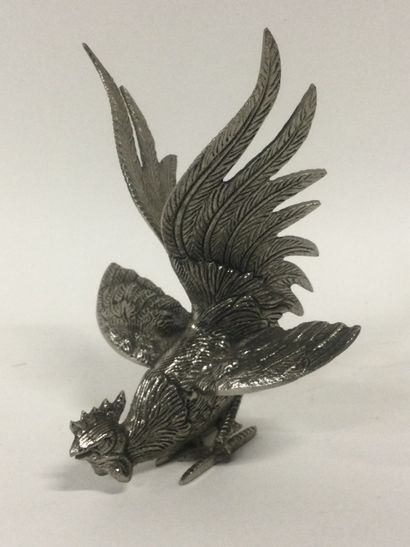 Sculpture en métal argenté figurant un coq...