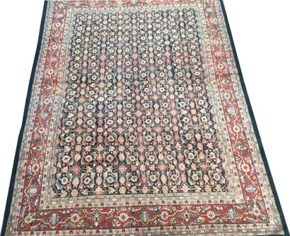 null IRAN, Large hand-knotted silk GHOUM carpet with floral decoration spread over...