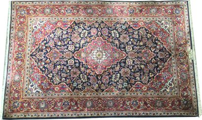 null IRAN, KACHAN carpet with central medallion representing a flowered rosette on...