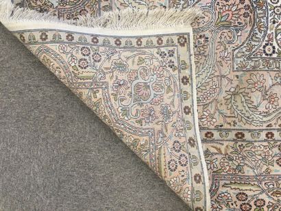 null IRAN, Mechanical KACHAN carpet in silk with floral decoration and central medallion...