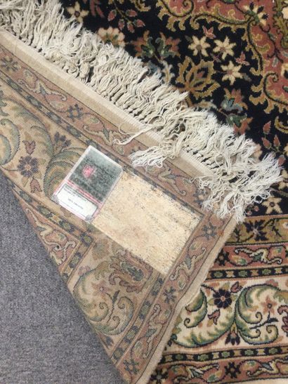 null IRAN, Mechanical KACHAN carpet in wool with floral decoration and central medallion...
