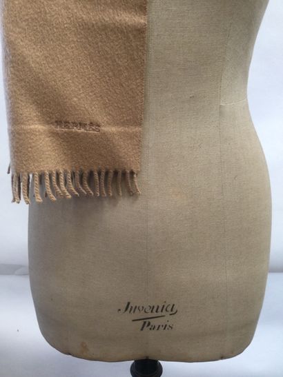 null HERMES, Paris, Double-sided 100% camel cashmere scarf with fringed edges. Label...