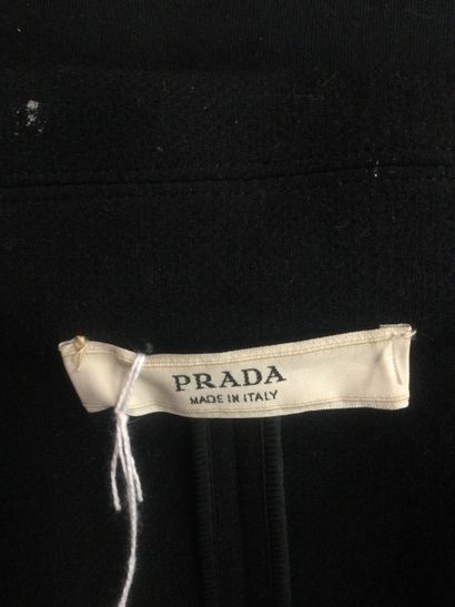 null PRADA, Men's black wool coat, double breasted with eight buttons, wide notched...