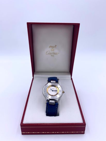null CARTIER, Lady's Must watch, round dial in steel and vermeil, blue leather strap,...