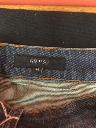 null GUCCI, blue denim men's jeans, faded effect, logo on the right pocket. T44

Good...