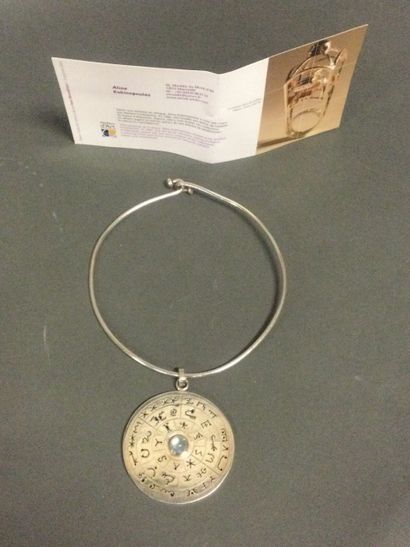 Aline K. silver necklace/pendant of circular...