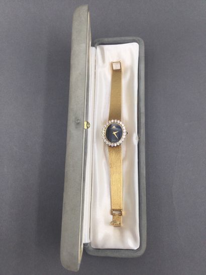 null BAUME & MERCIER, Ladies' watch in 18K yellow gold 750/°°, oval case with bezel...