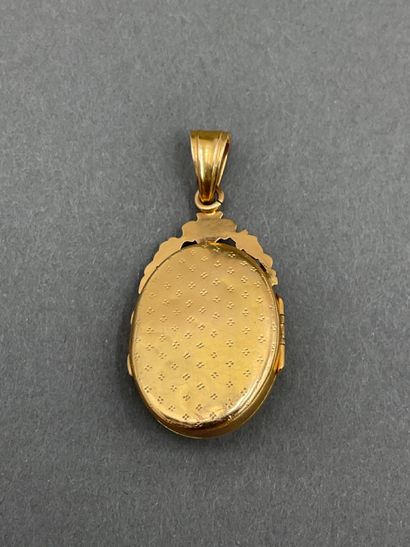 null PENDANT in yellow gold 18K 750/°° decorated with a flower and a small central...