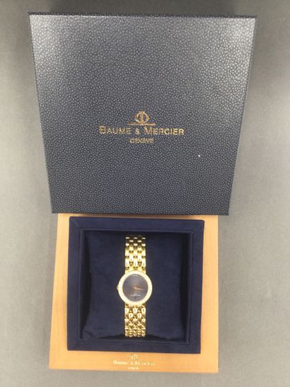 null BAUME & MERCIER, Montre de dame en or jaune 18K 750/°°, boitier rond à lunette...