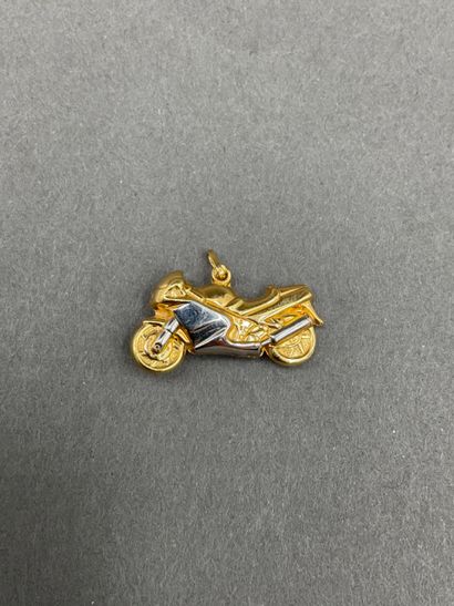 null PENDANT in the shape of a motorcycle in 18 K gold, hallmark 750, weight: 1.49...