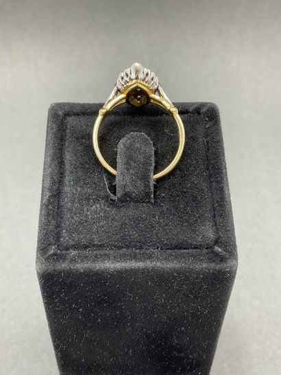  navette ring in two-tone 18K gold set with brilliant-cut diamonds, eagle head hallmark,...
