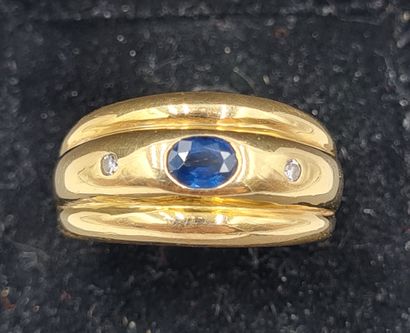 null RING in 18K yellow gold 750/°° set with a small oval sapphire and surrounded...