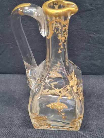 null Attributed to DAUM, Circa 1890, Small glass decanter with acid-etched floral...