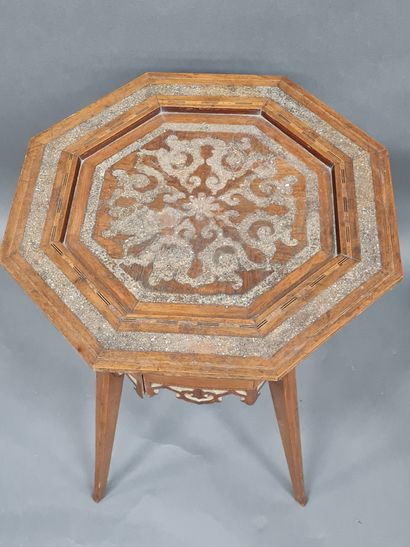  Oriental style pedestal table, carved wood, burgundy decoration and marquetry, H....