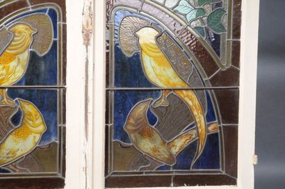 null GRUBER Jacques 1870-1936 - quatre vitraux à décor floral et d’oiseaux (accidents)...