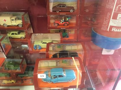 null En voiture Tintin, 6 modèles en métal : 2 "Coke en stock" et 4 "Tintin au pays...