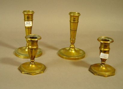 null 213- Deux paires de bougeoirs en métal doré
Fin XVIIIème - début XIXème siè...