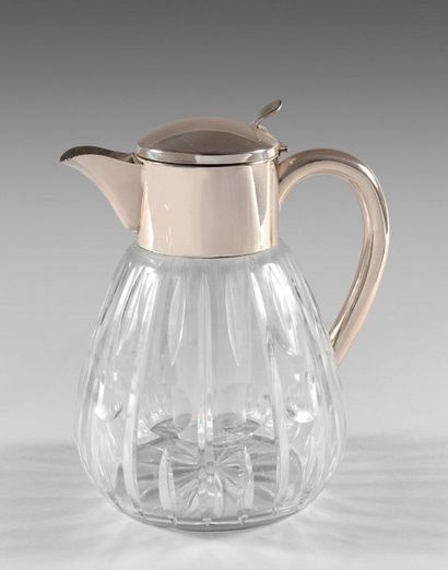 null 226- Orangeade pitcher and its crystal cooler

Silver plated metal frame

H:...