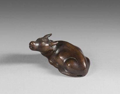 97- Bronze okimono representing a buffalo...
