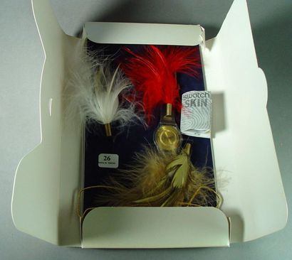 null 26- SWATCH Skin

Festive feather watch in its packaging