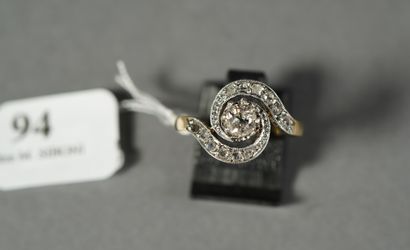 null 94- Yellow gold ''Tourbillon'' ring set with a 0.3 ct old cut diamond enhanced...